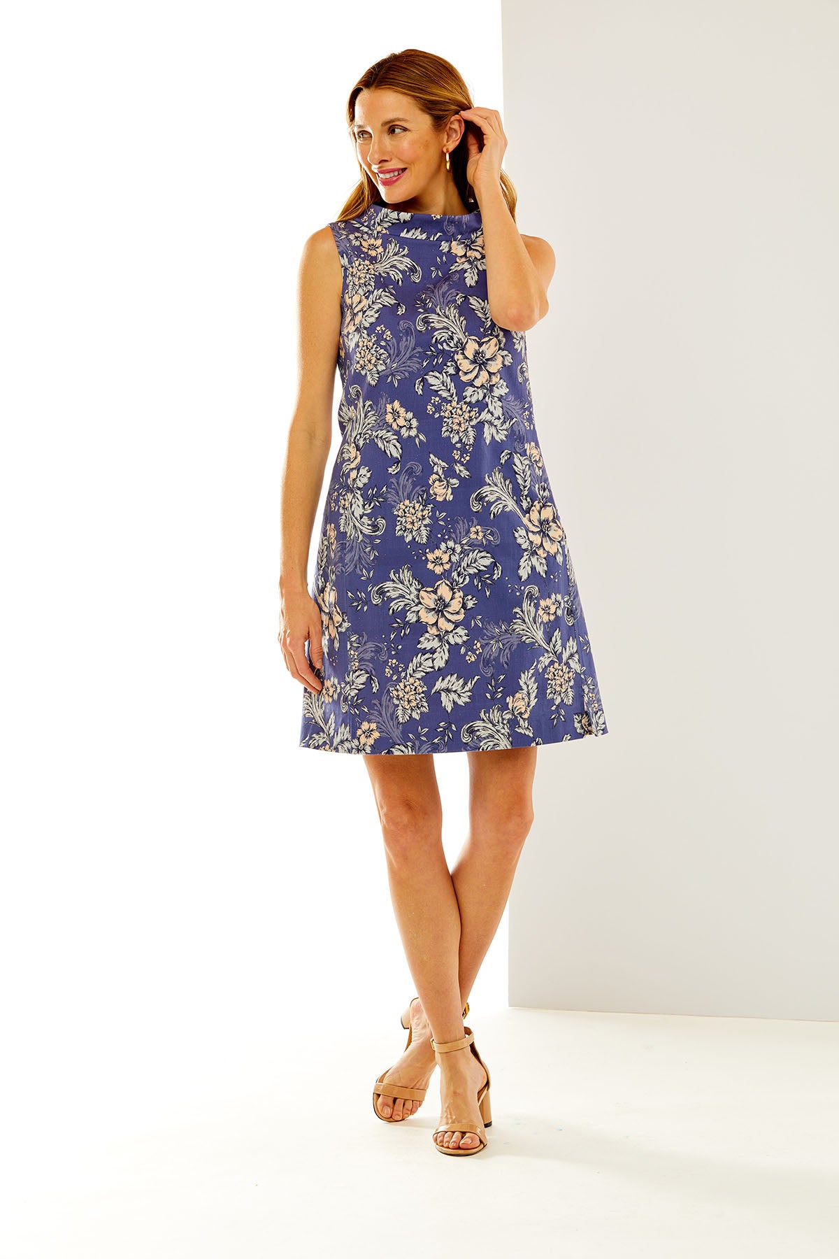 Woman in blue floral dress