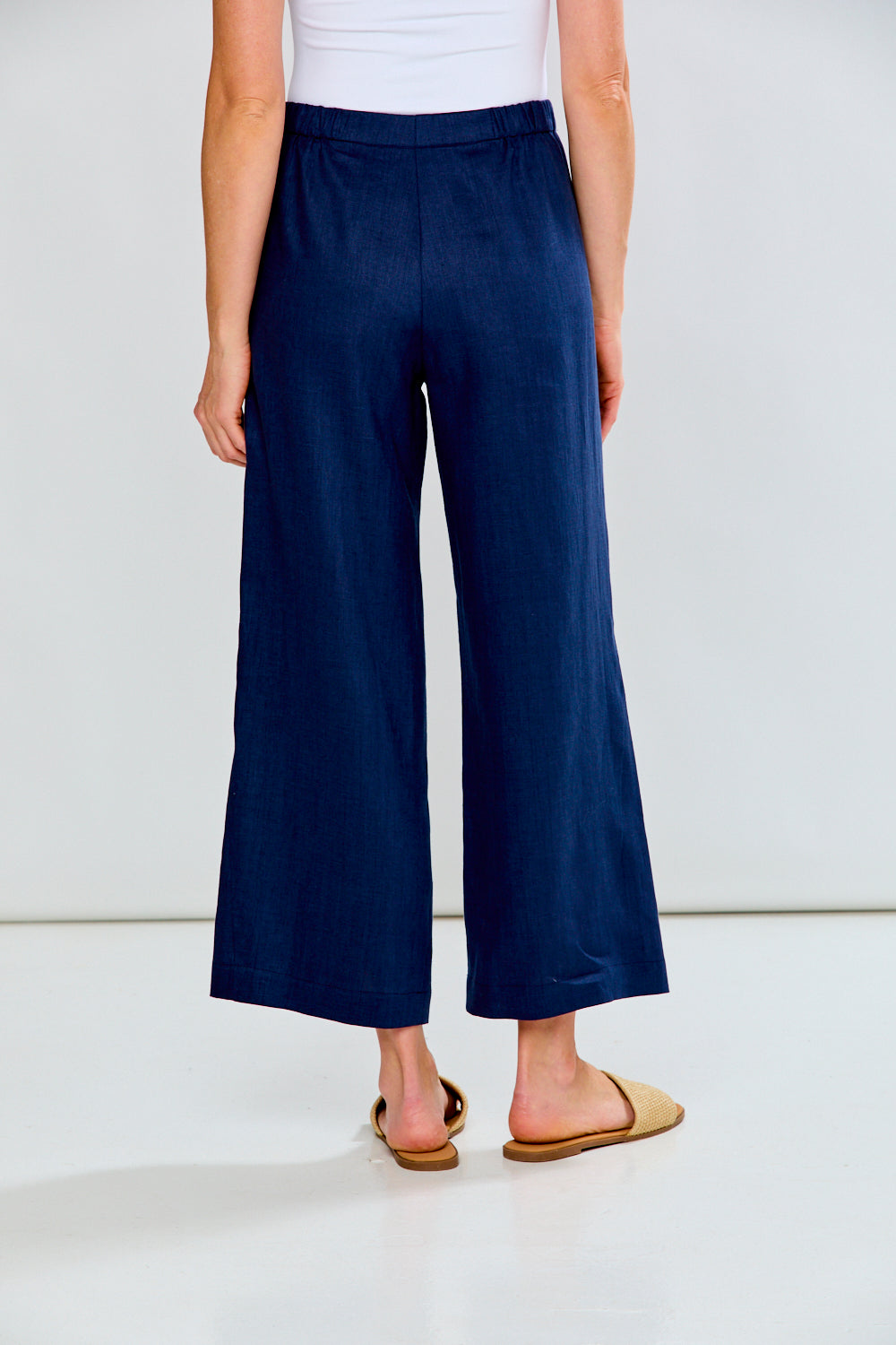 Woman wearing The Alessandra Pant - Navy