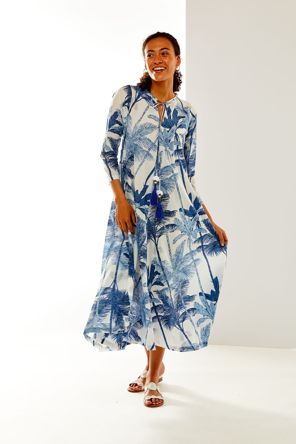 Woman in blue leaf tunic