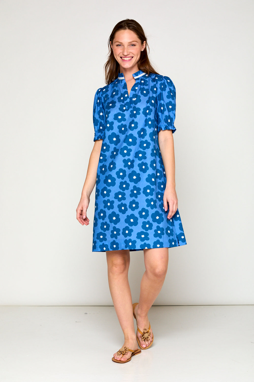 Woman in blue daisy dress