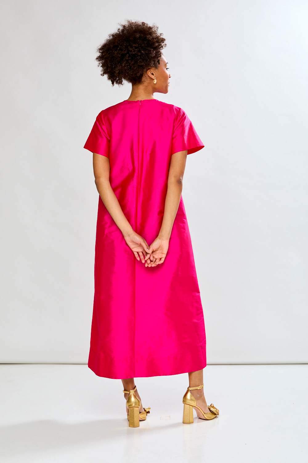 Woman in fuchsia dress 
