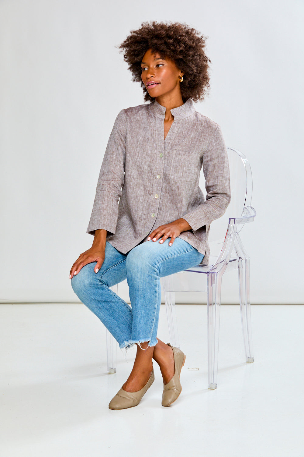 Woman in mocha linen top with jeans