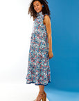 Woman in midi floral dress