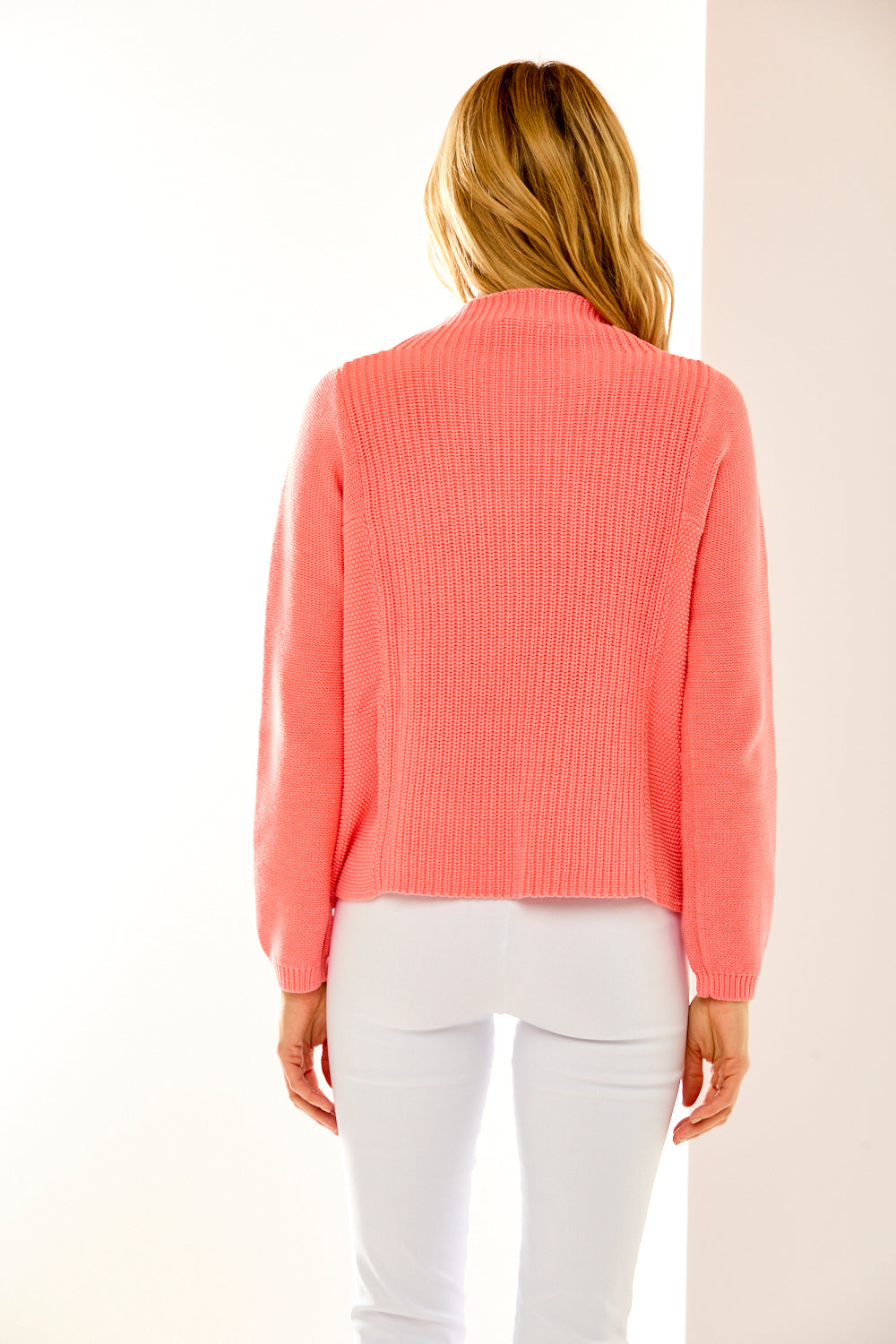 Woman in mock neck sweater