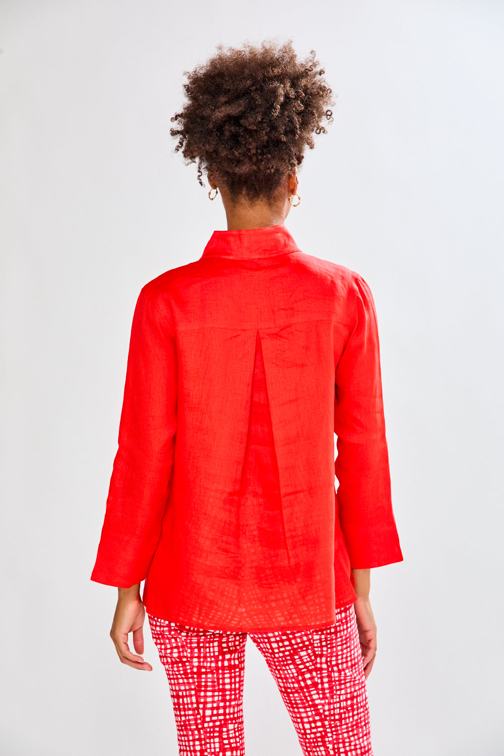 Tomato colored shirt on a women