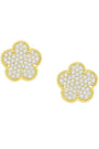 Gold flower-shaped earrings with clear gemstones on a white background