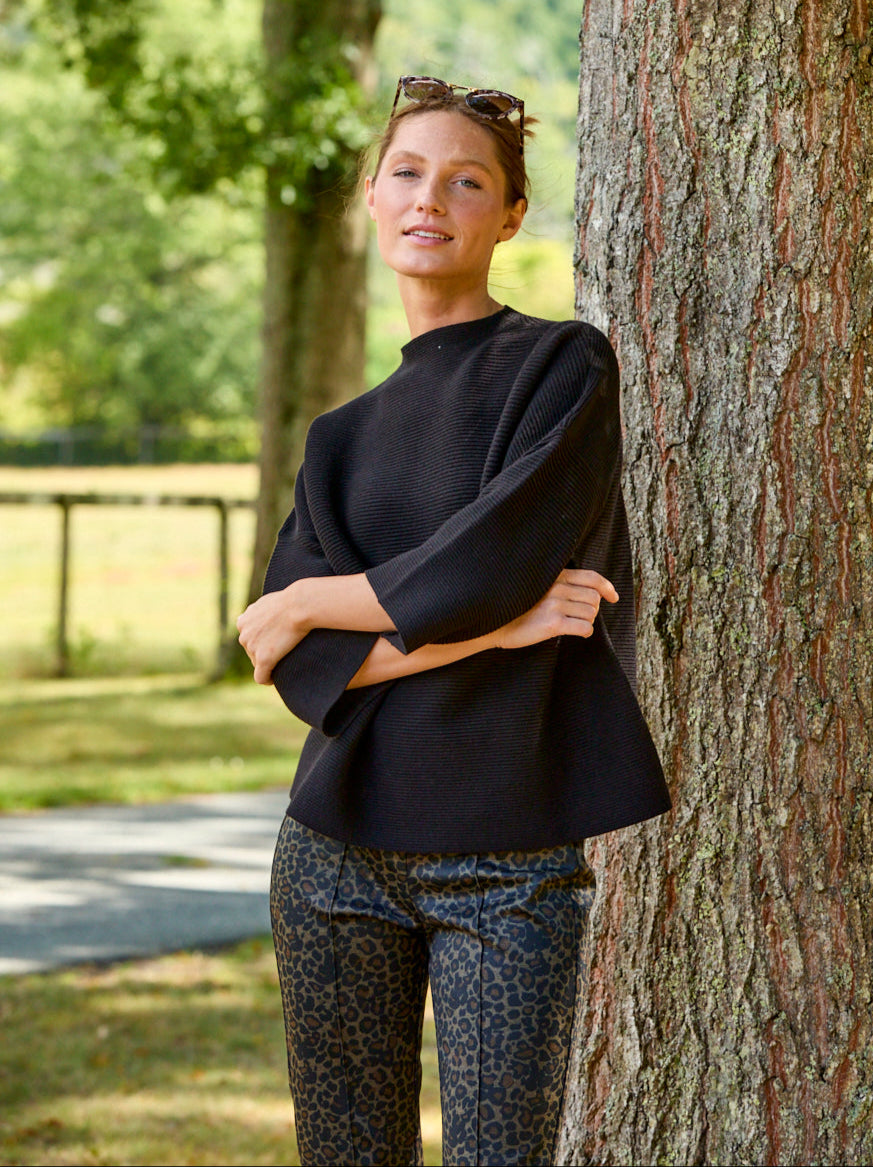 Woman wearing a black sweater