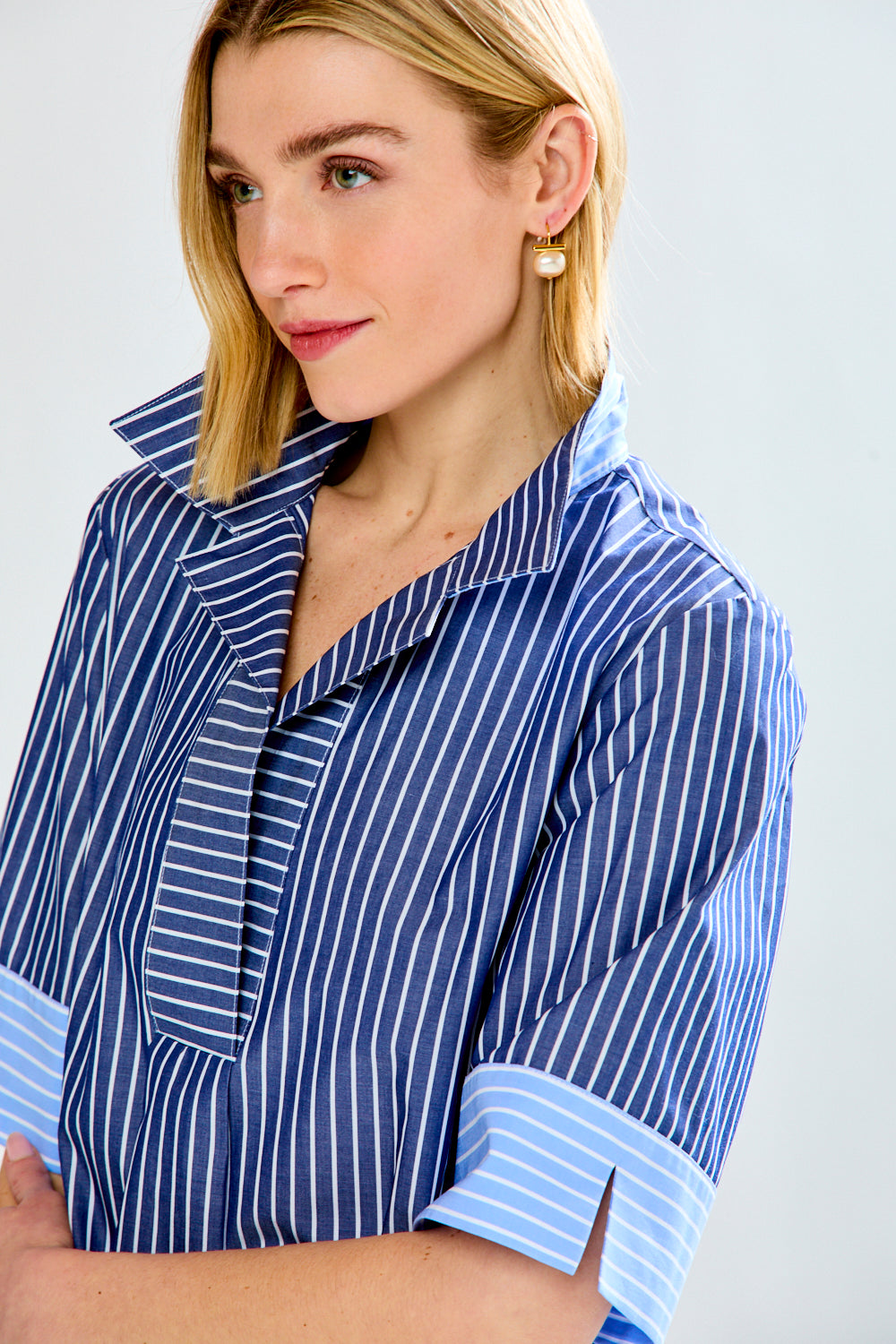 Woman in blue striped dress