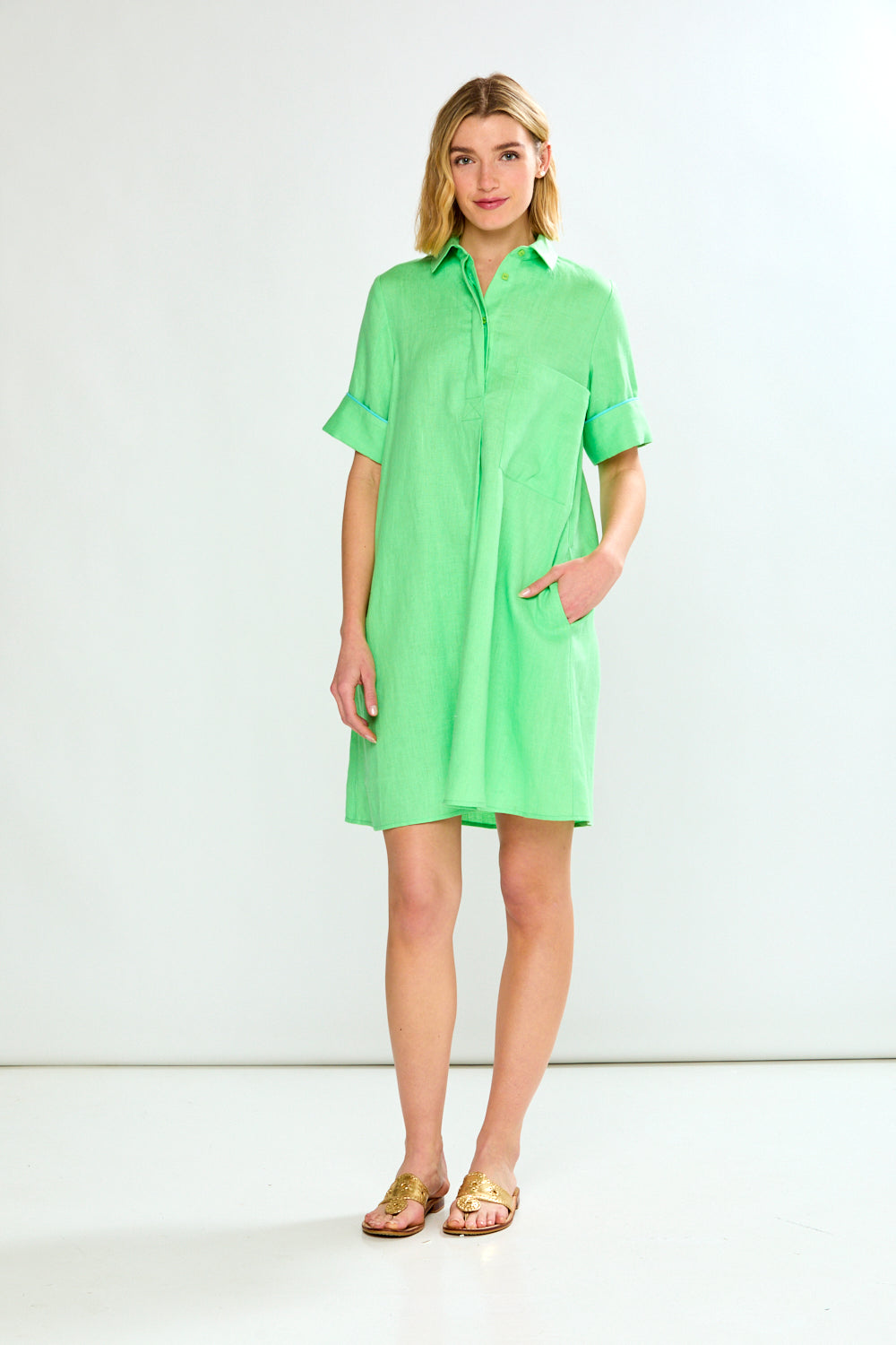 Woman in green linen dress