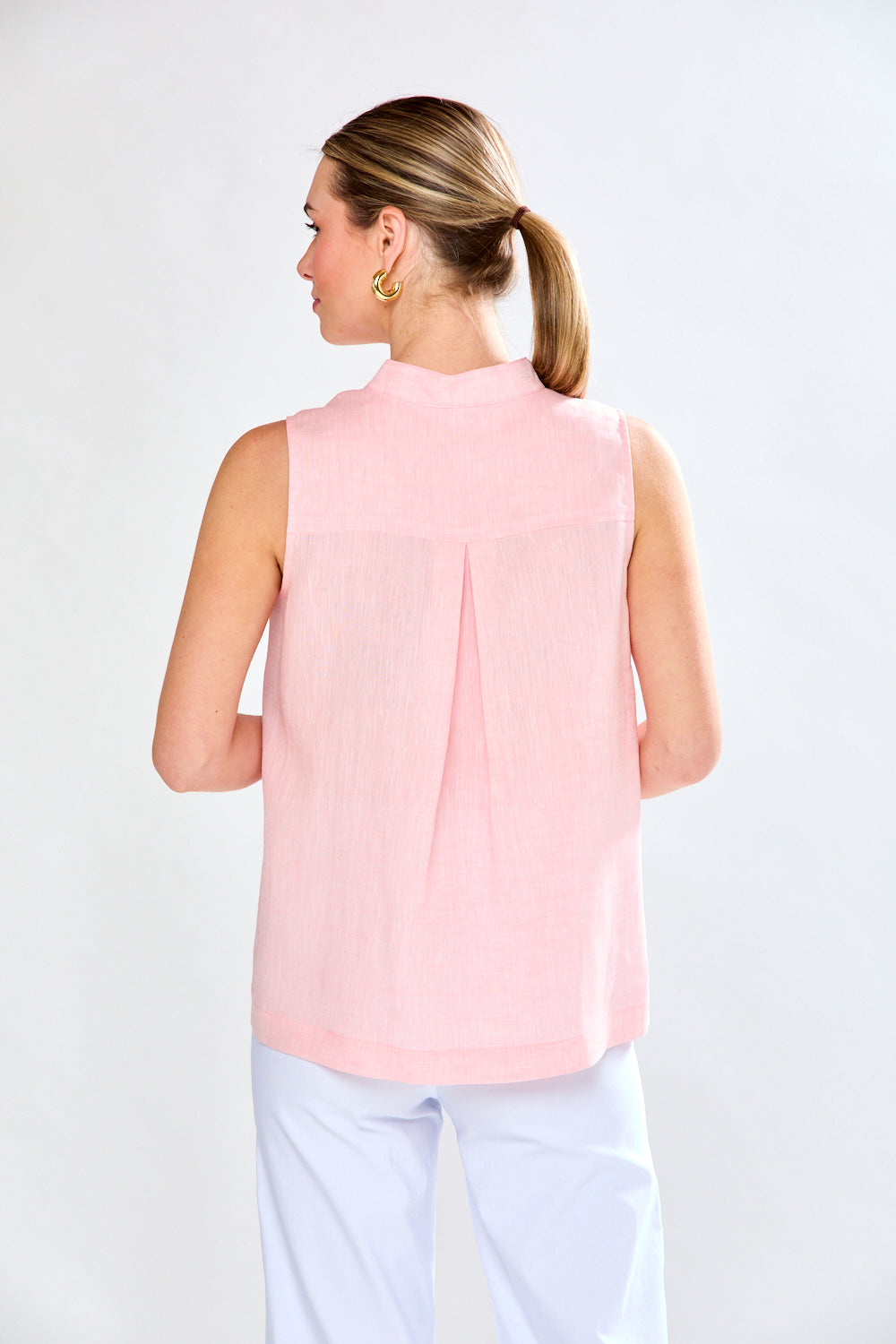 Woman in sorbet linen top