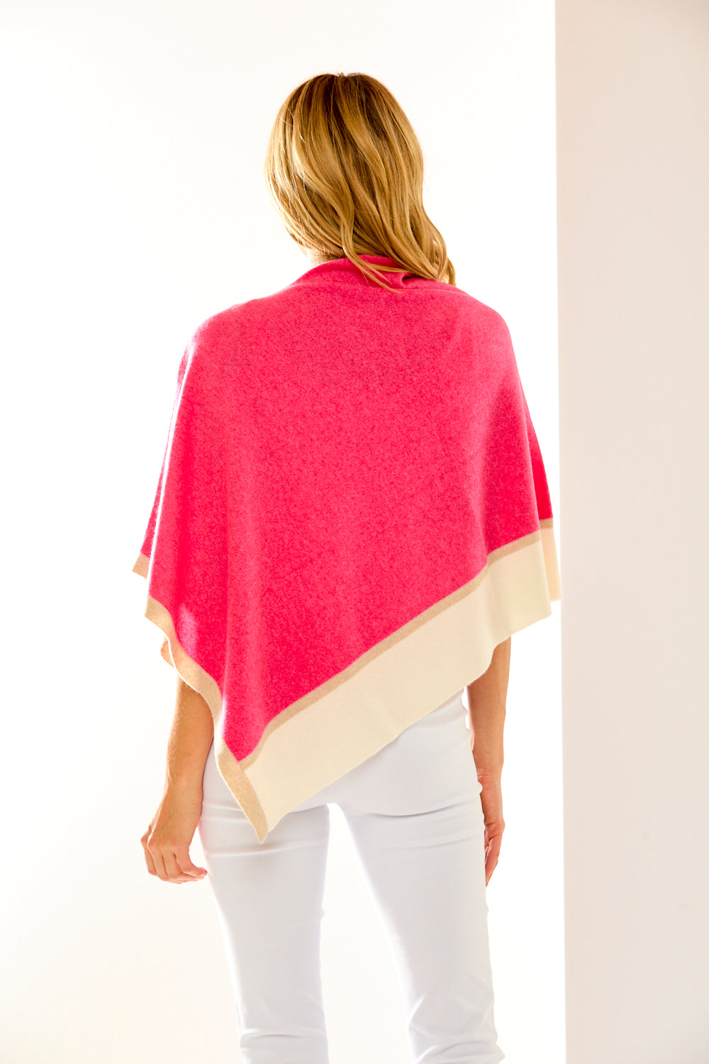 Woman in pink cashmere ruana