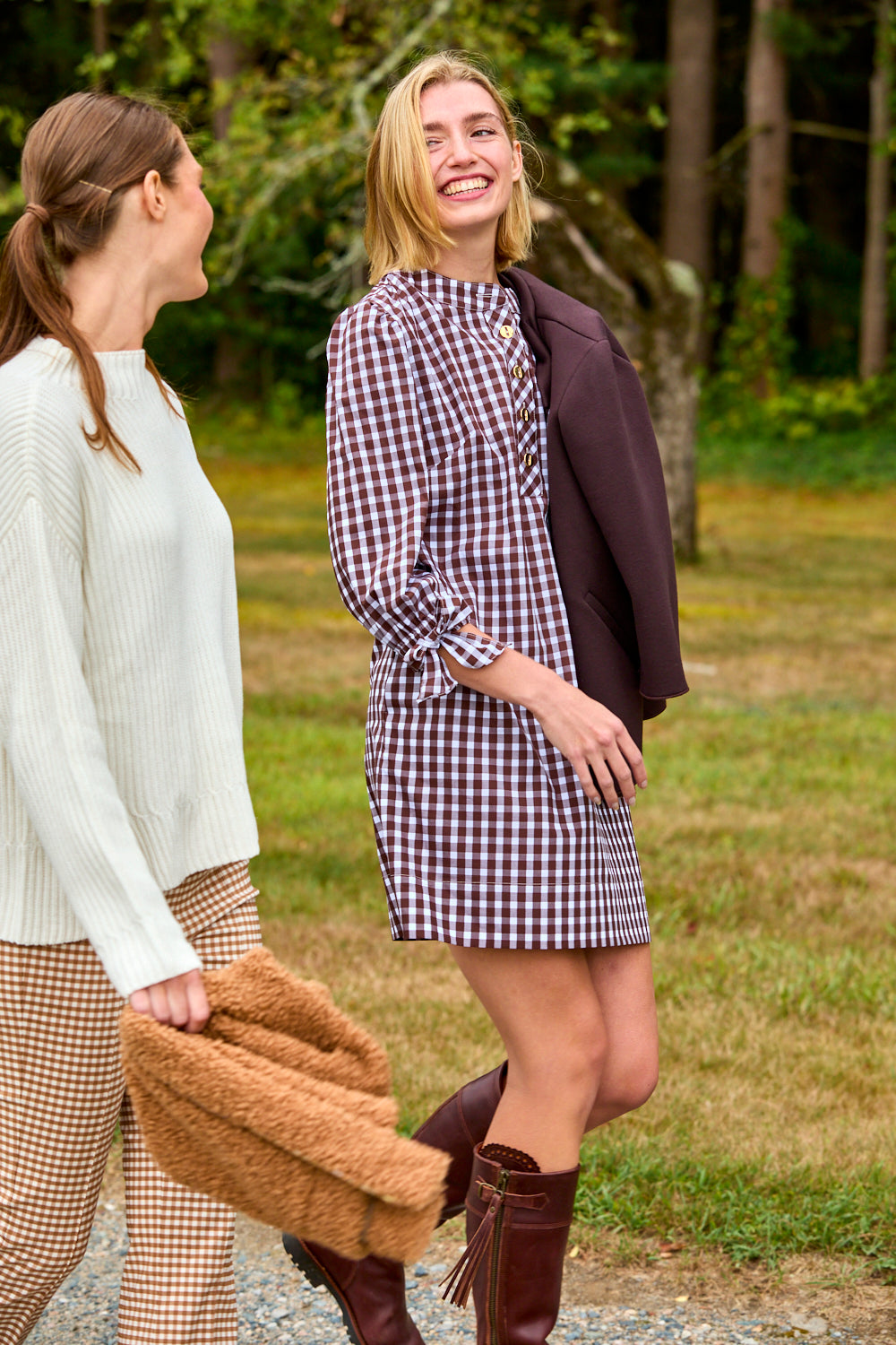 Two women walking side by side