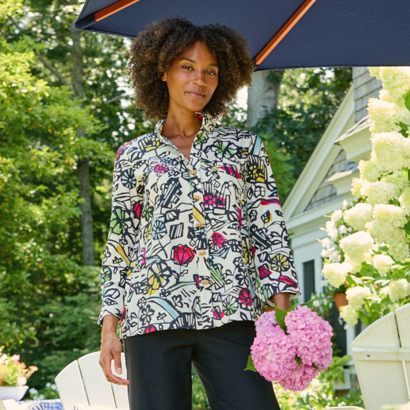 A woman wearing The Thea Tunic in Graphic Floral