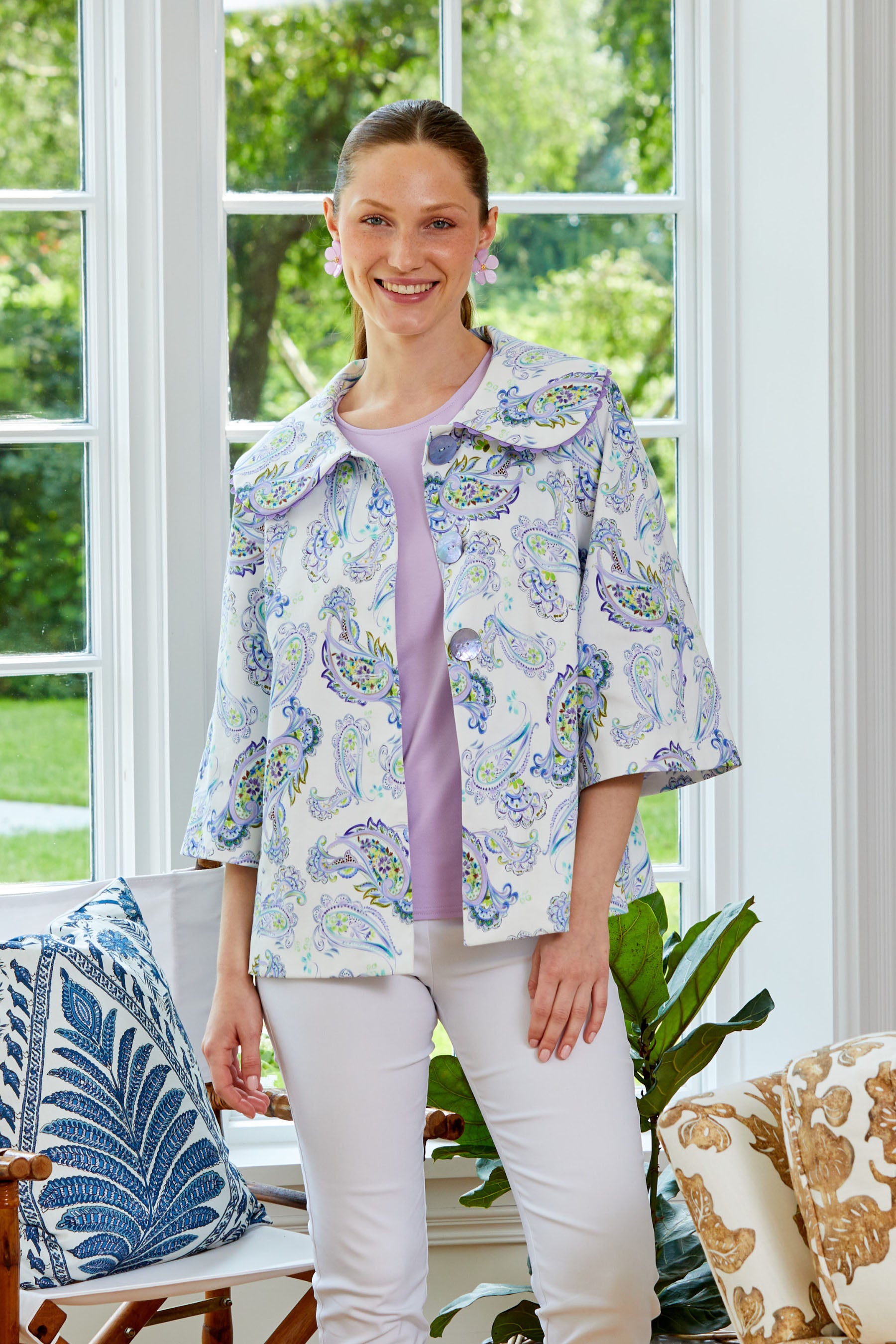 woman in purple paisley print jacket