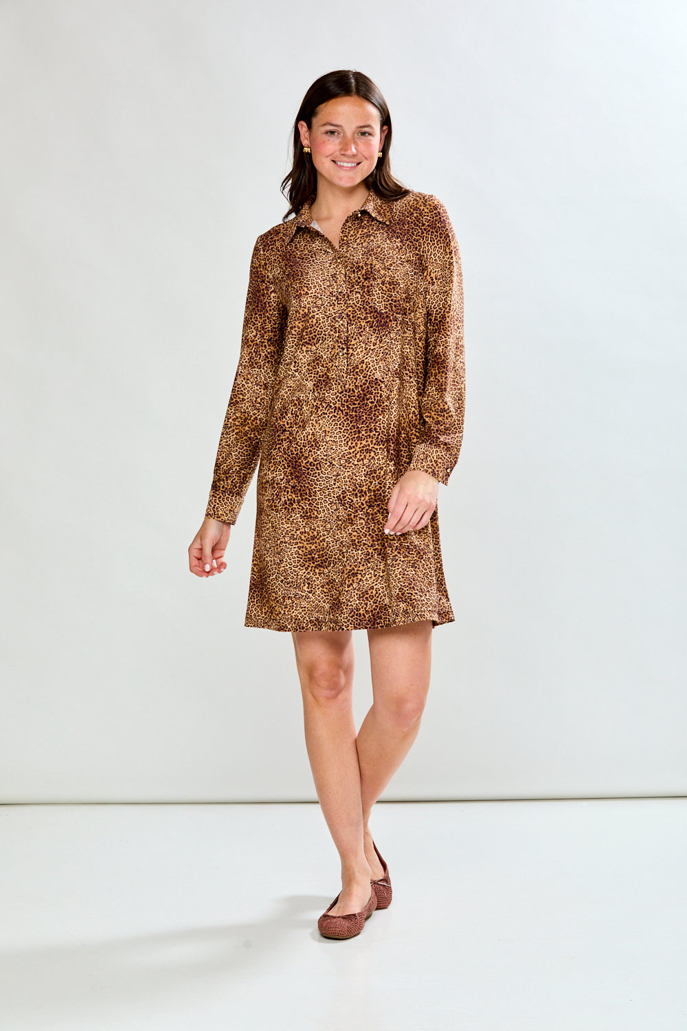 Woman in animal print dress