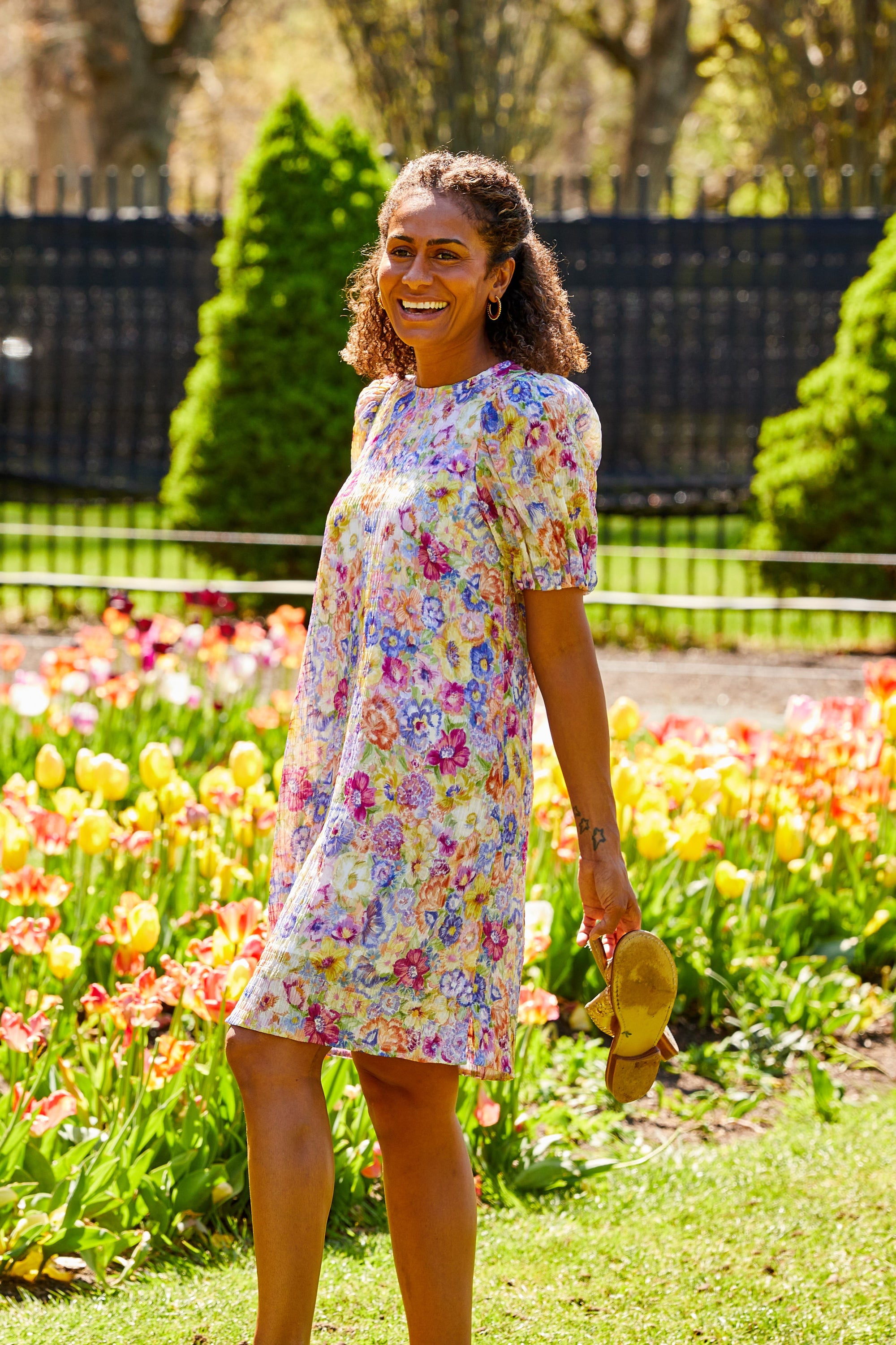 WOMAN IN PINK FLORAL DRESS