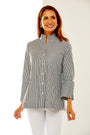 Woman in black and white stripe shirt