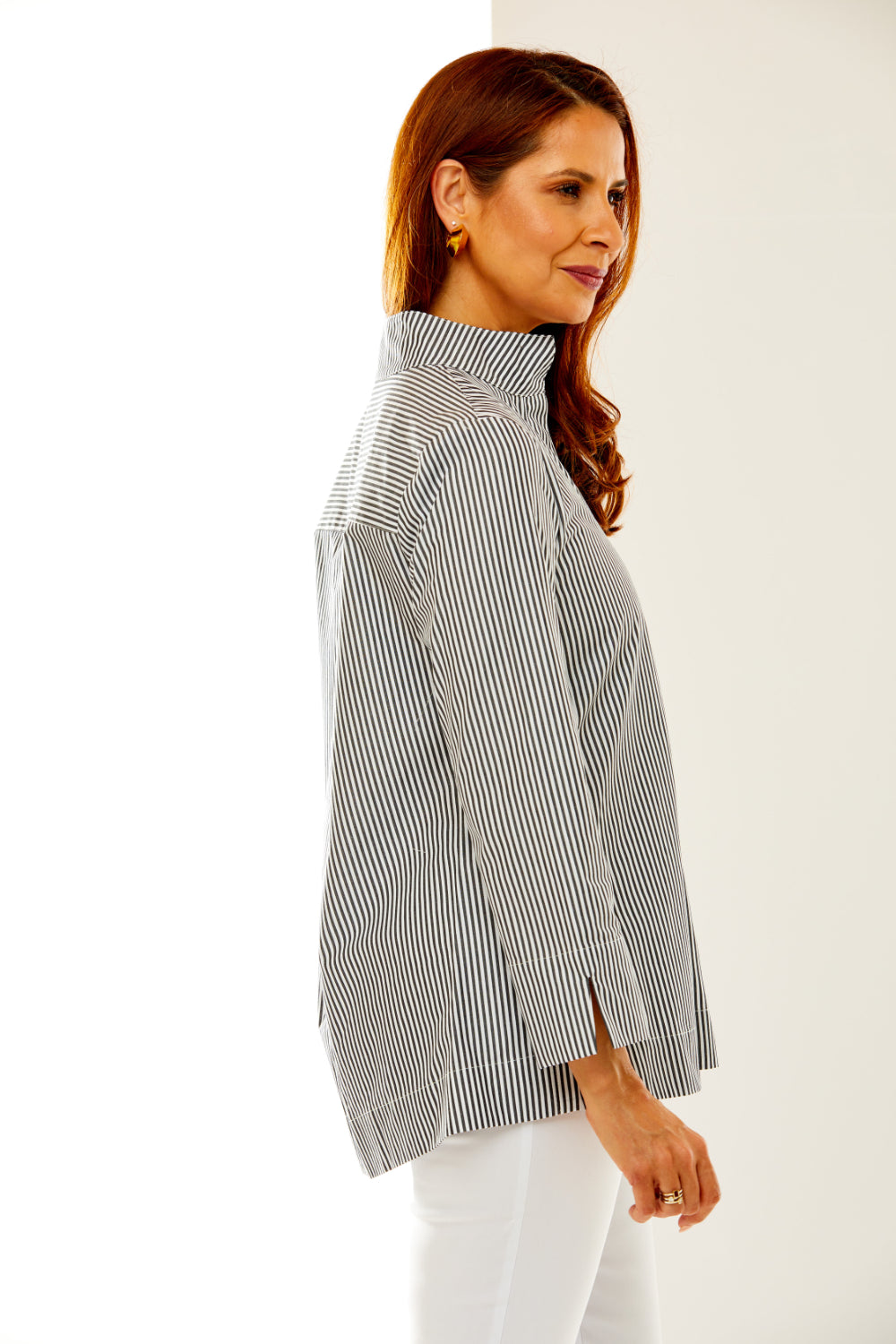 Woman in black and white stripe shirt