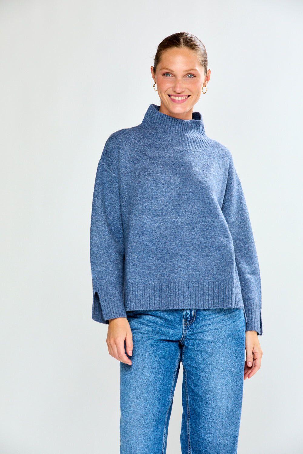 Woman in denim sweater with jeans