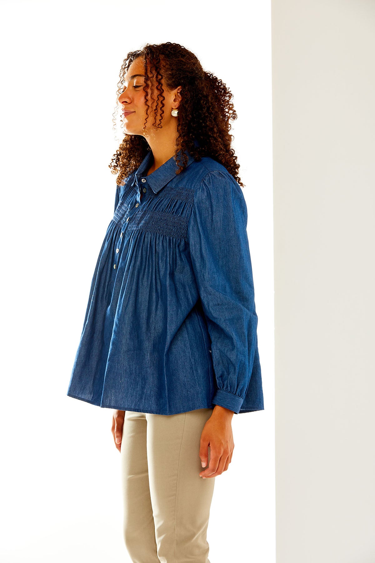 Woman in chambray shirt