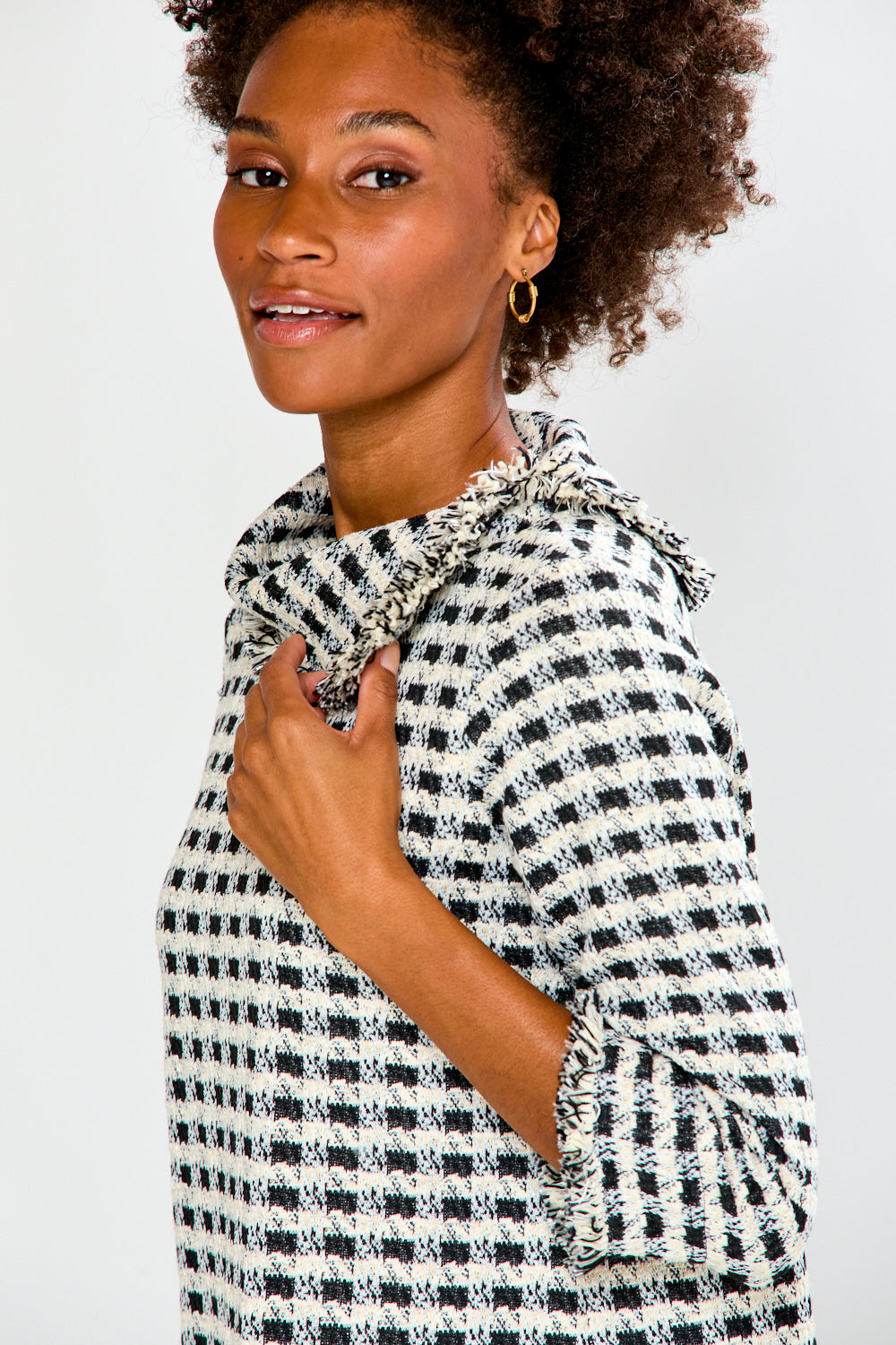 Woman with black and white check blouse