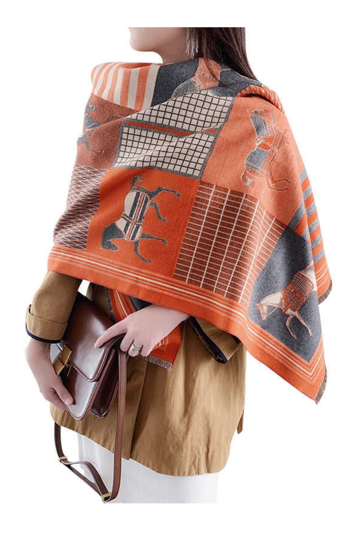 Woman in orange equestrian scarf