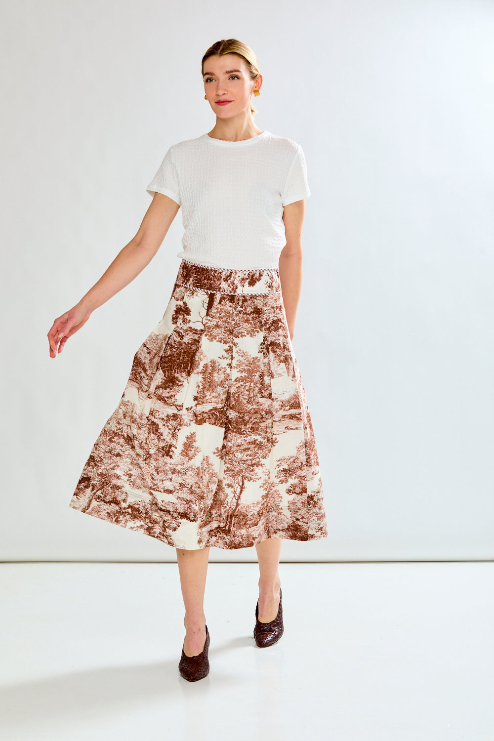 Woman in toile print skirt