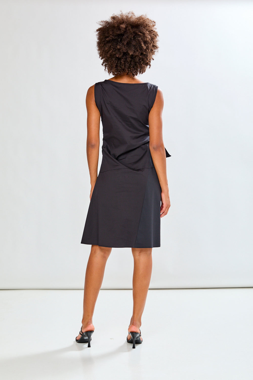 woman in a black dress