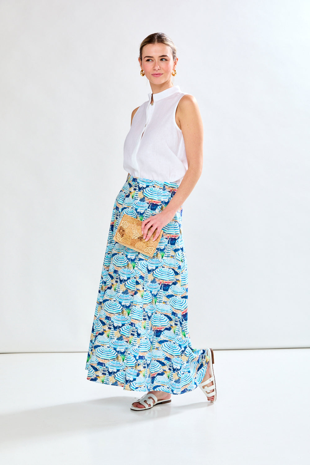 Woman in blue printed skirt