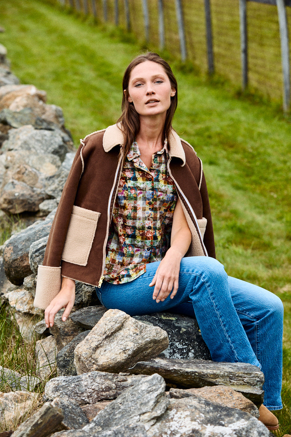 Woman wearing a brown sherpa jacket