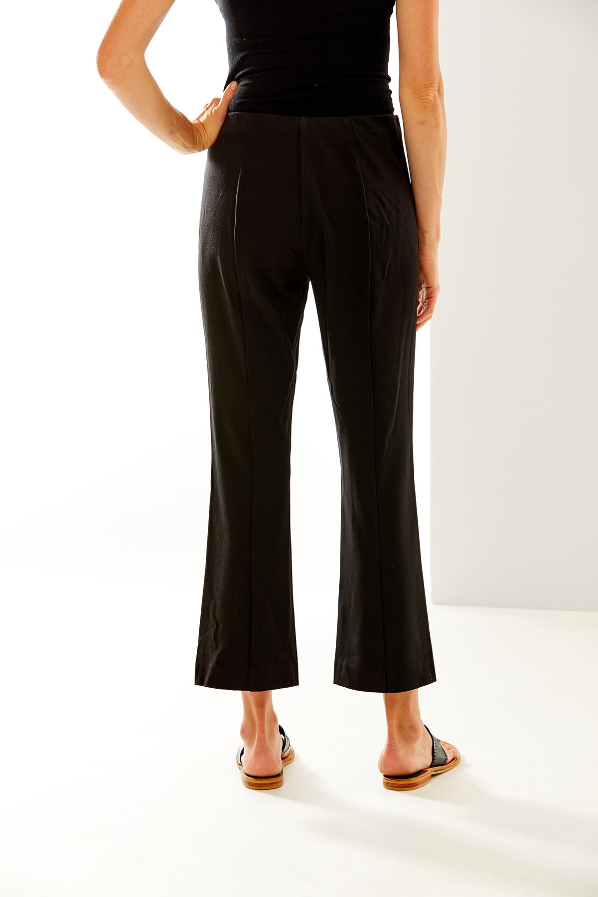 Woman in black cropped pant