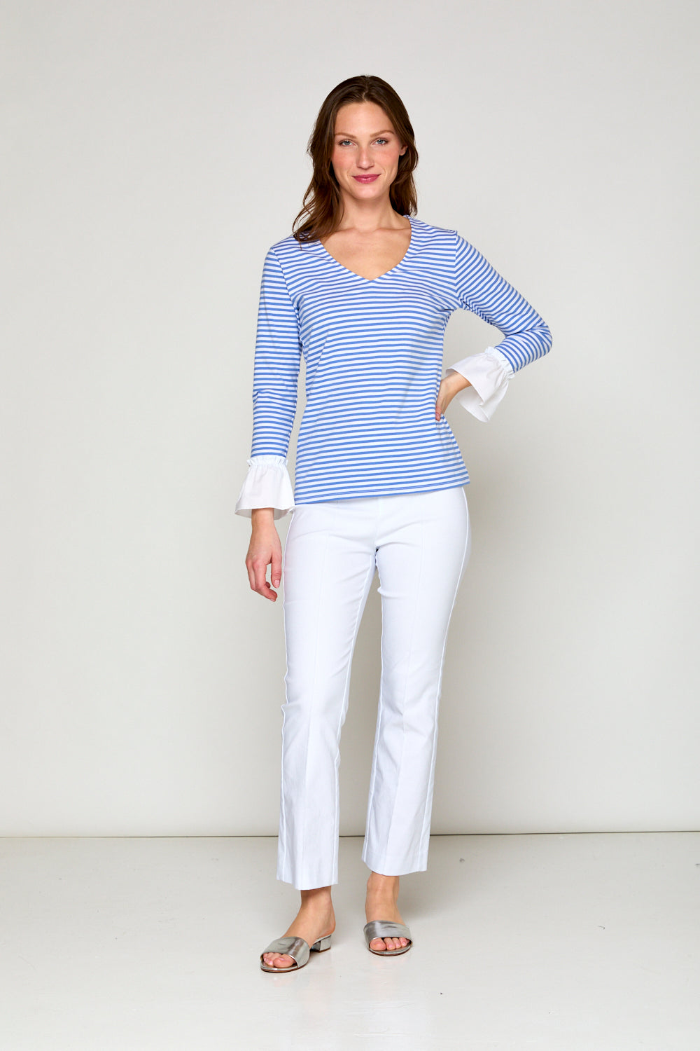 Woman in blue and white stripe top