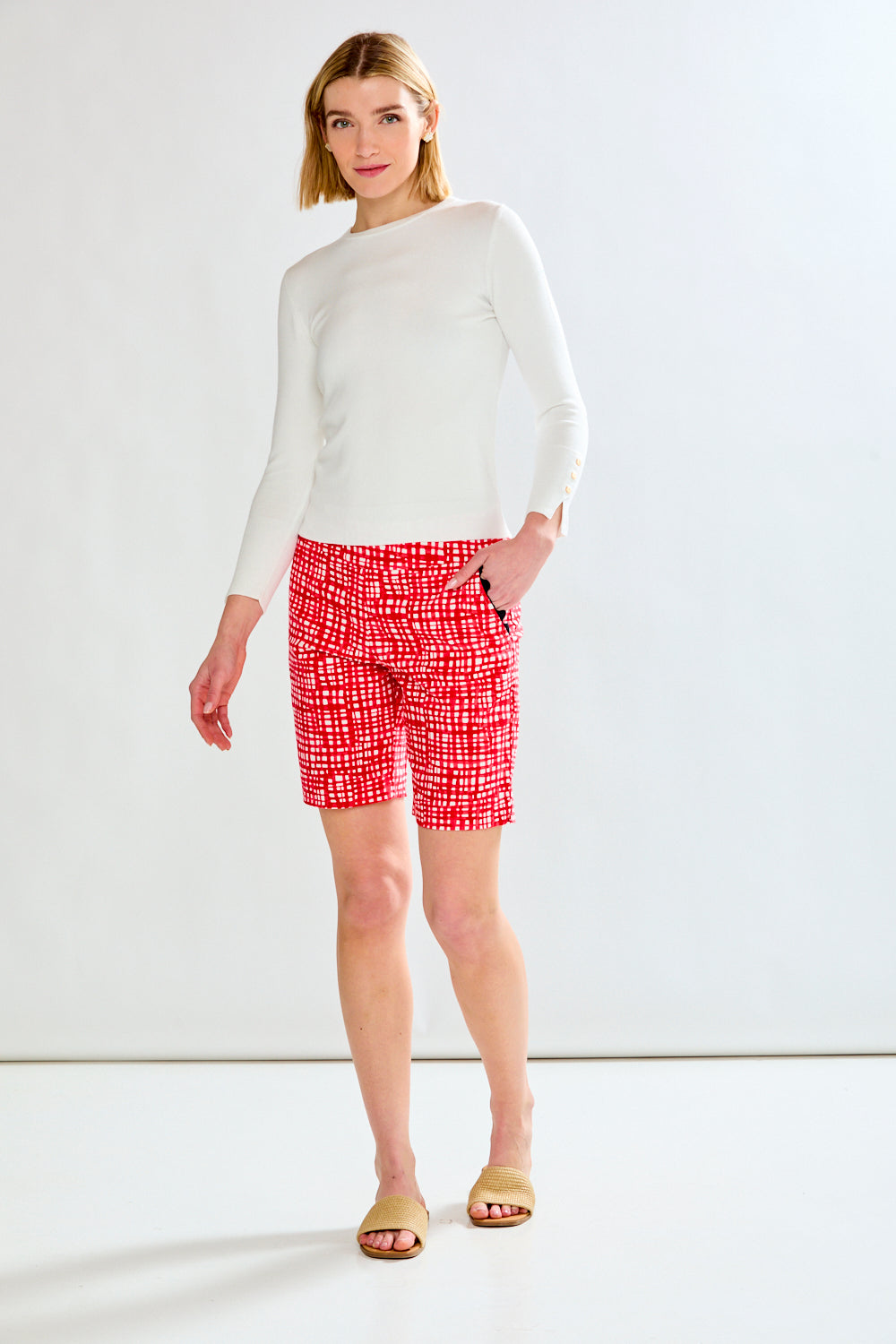 Woman in red pattern shorts