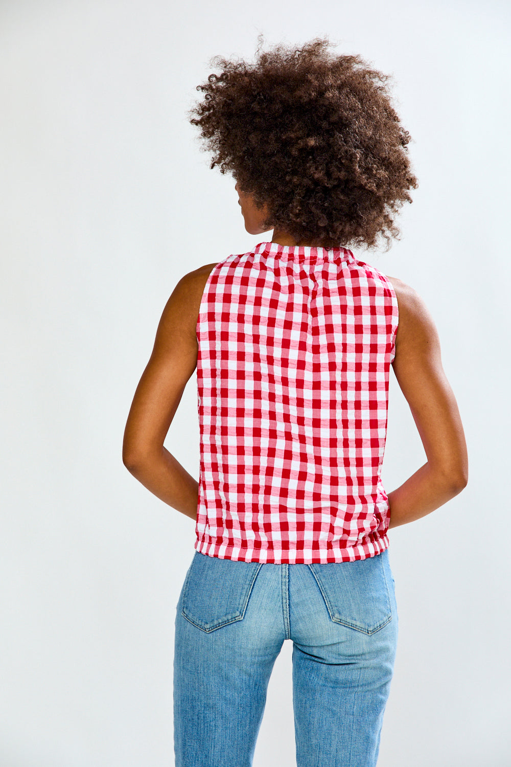Woman in gingham top