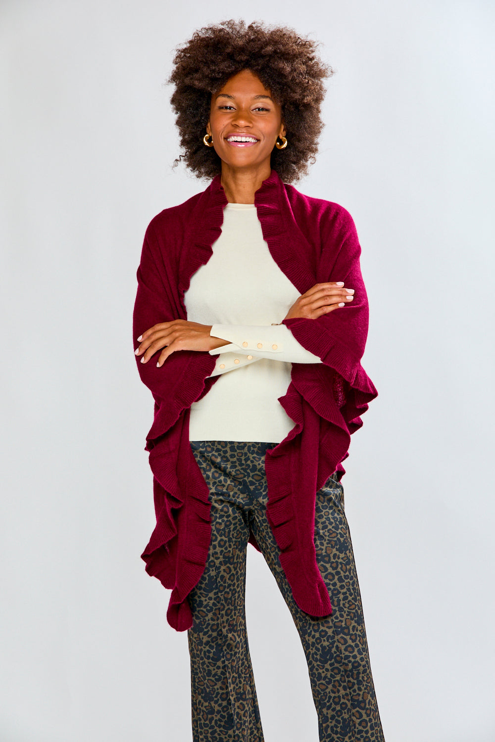 Woman wearing a raisin ruffle cashmere wrap