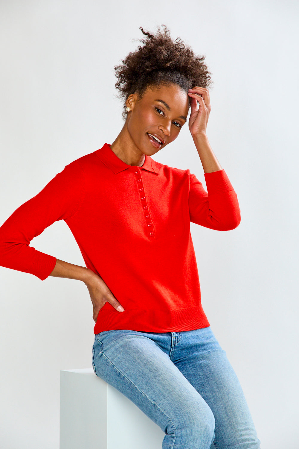 woman in red sweater