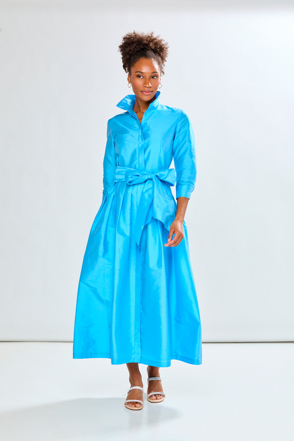 Woman in capri long taffeta dress