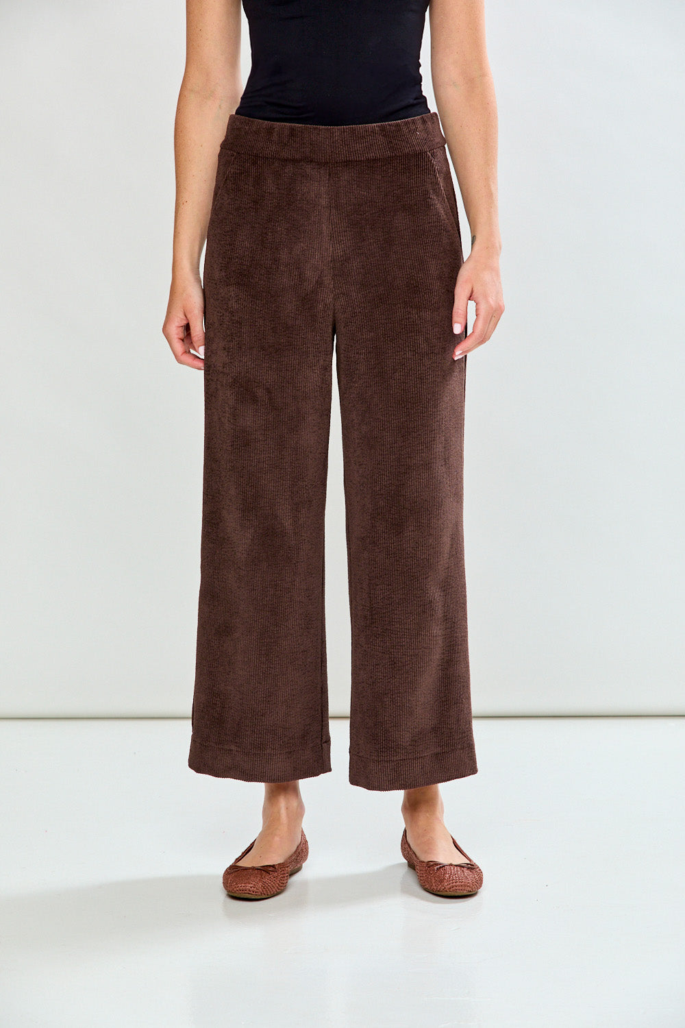 Woman in espresso corduroy pant