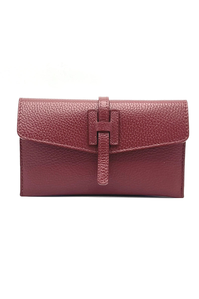 Red leather wallet on a white background