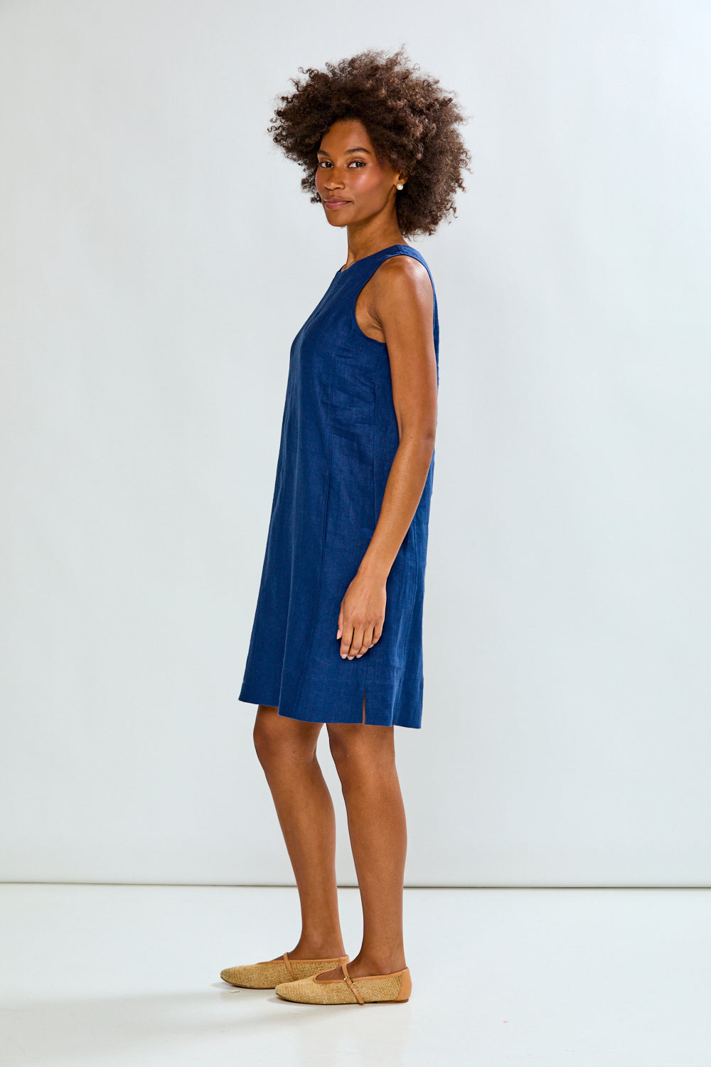 Woman in navy linen dress