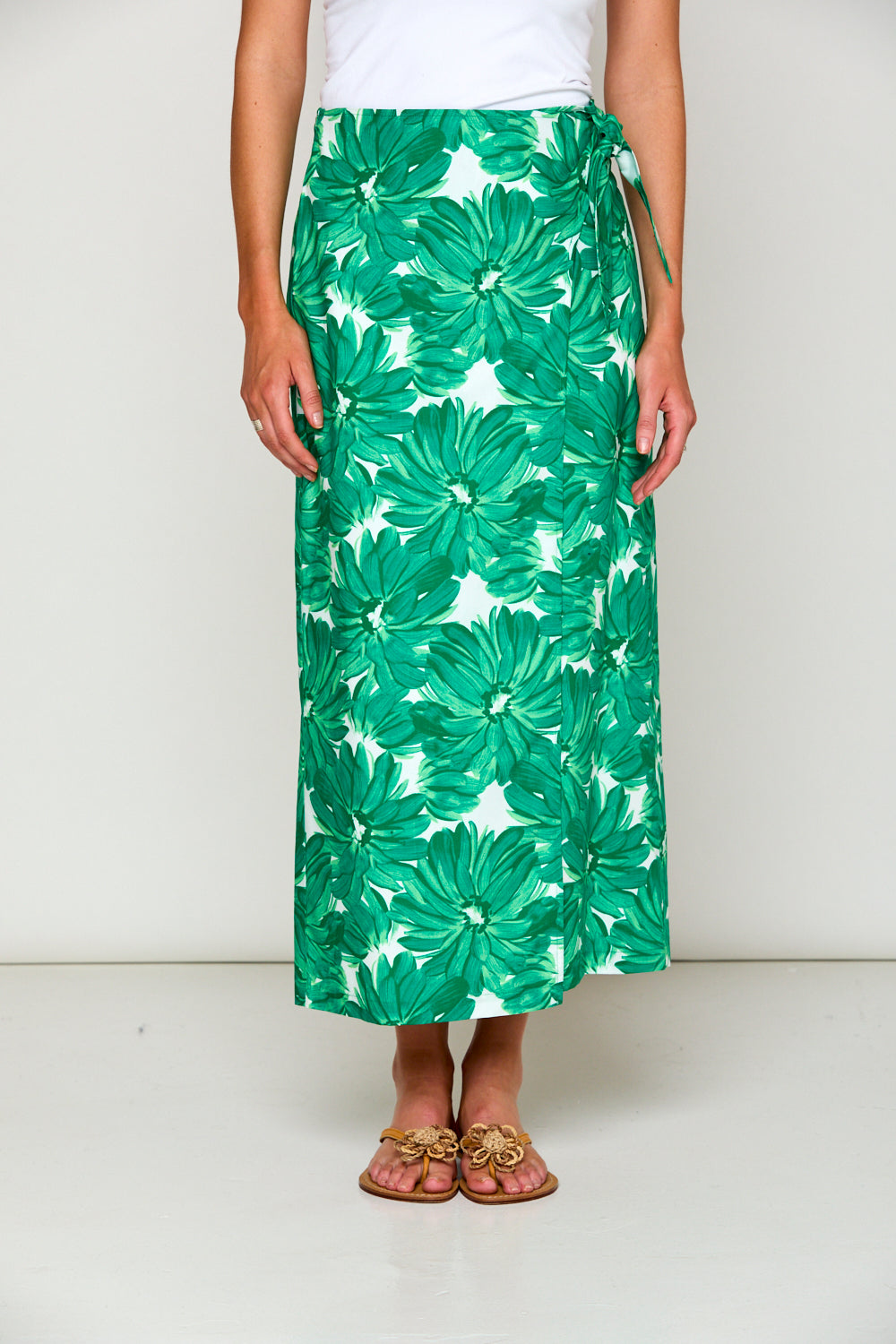 Woman in tropical print skirt