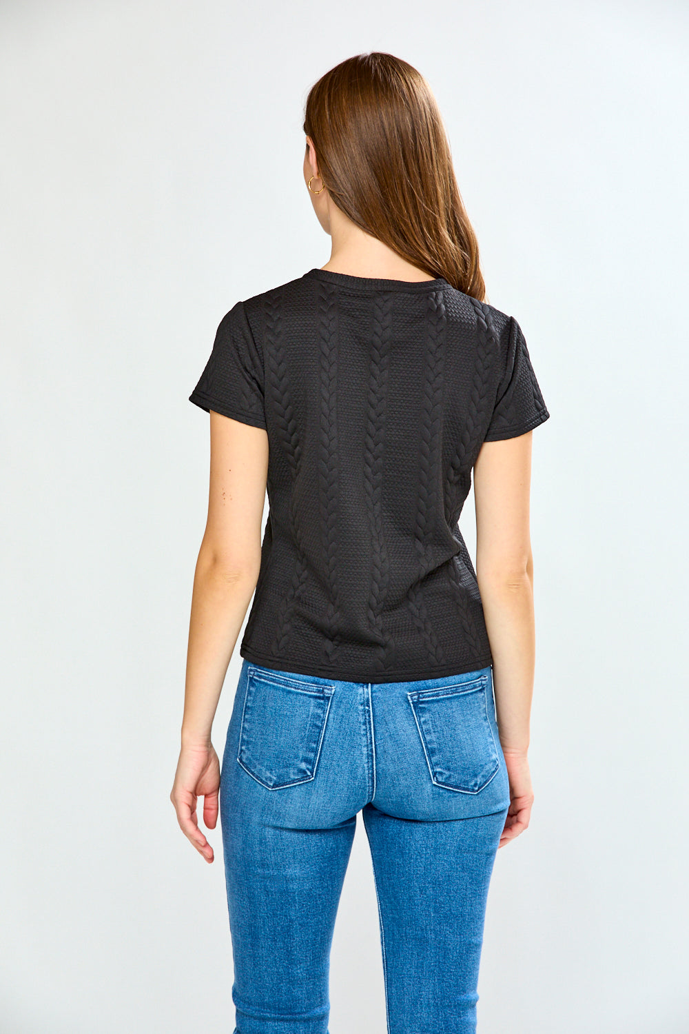 Woman wearing The Pamela Top in Cable
