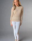Woman in parchment cashmere pullover