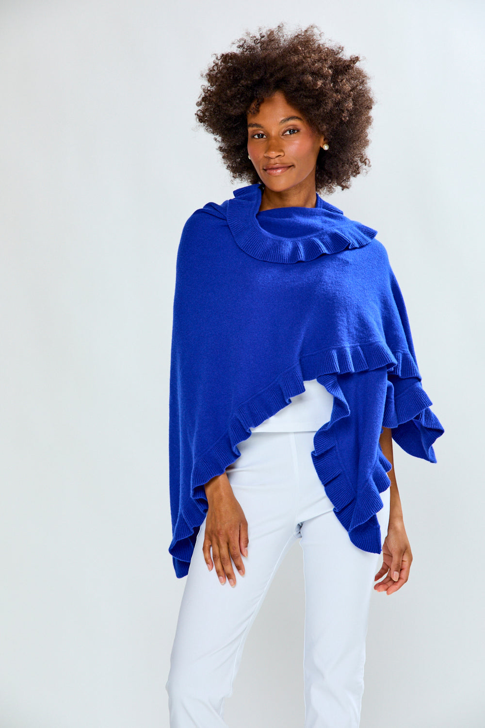 Woman in blue cashmere triangle wrap