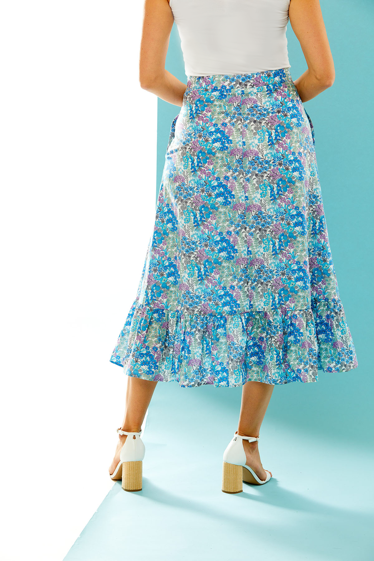 Woman in floral printed skirt