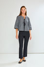 Woman wearing The Aurora Jacket in Check in Black Check