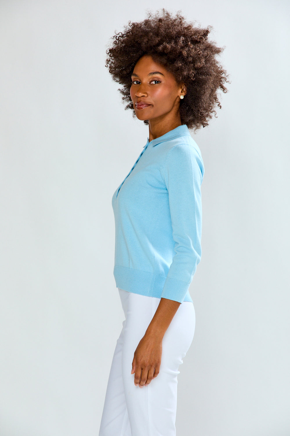 woman in light blue sweater
