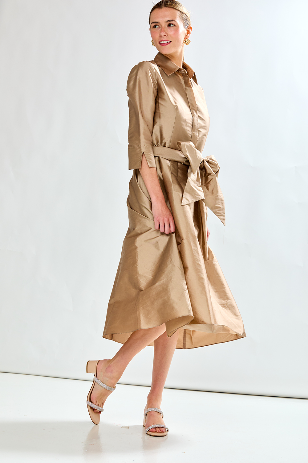 Woman in mocha taffeta dress