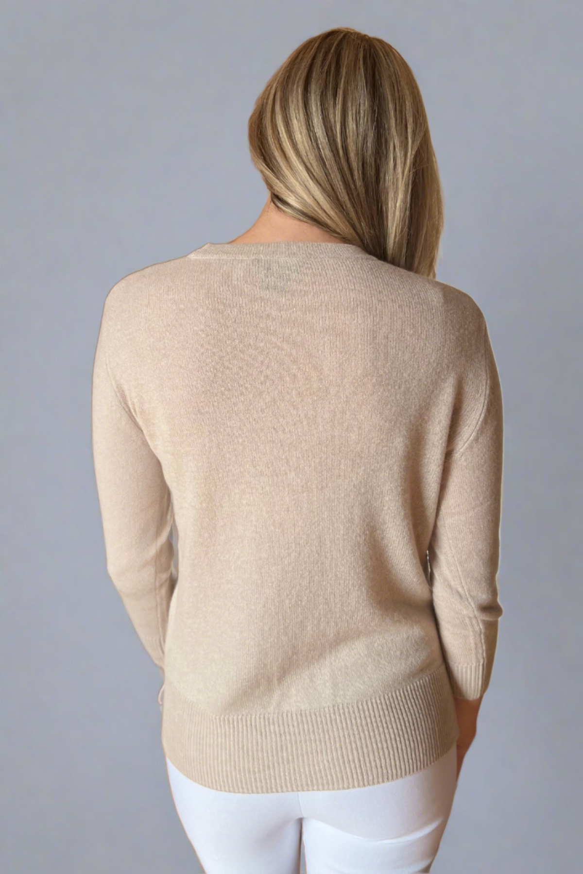Woman in parchment cashmere pullover