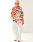 Woman in floral mo blouse